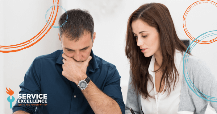 A husband and wife talking to each other